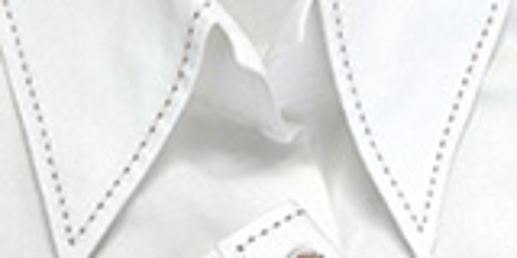 Collar of a white shirt with a decorative stitch